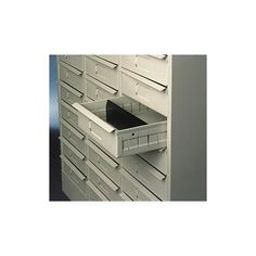 several drawers are stacked on top of each other in this office file cabinet with one drawer open