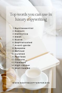 the top words you can use in luxury copywriters are displayed on a table with coffee and croissants