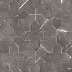 an abstract tile design in grey and white