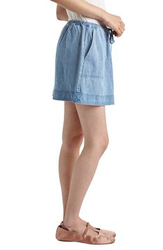 Keep the look low-key and relaxed in this light-wash lyocell-denim miniskirt topped with a drawstring waist. Drawstring waist Front scoop pockets 100% Tencel® lyocell Tencel lyocell is a more-sustainably produced fiber made with closed-loop processing Machine wash, tumble dry Imported Casual Mini-length Skort With Drawstring, Casual Mini Skort With Drawstring, Casual Mini Length Denim Skirt, Casual Mini Skirt With Drawstring, Casual Short Skirt For Spring, Casual Medium Wash Denim Skirt With Elastic Waistband, Denim Blue Cotton Skort For Spring, Medium Wash Mini Bottoms For Day Out, Medium Wash Mini Length Bottoms For Day Out