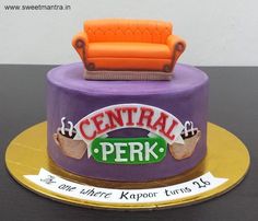 there is a cake that looks like a couch on top of a table with the words central perk