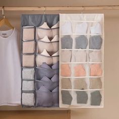 an organized closet with socks and t - shirts hanging on the wall next to a white tank top