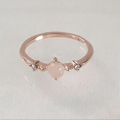 Rose Gold Plated Moonstone (Simulated) Ring. Features A Single “Moonstone” With A Single White/Clear Stone On Both Sides. Pretty When Worn Alone Or Stacked With Other Rings. Item Is New And Has Never Been Worn. Please Be Certain To Look At All The Photos Carefully. Please Do Ask Me About Any Questions You May Have Prior To Making A Purchase. Rose Quartz Ring Gold, Promise Rings Simple, Heart Wedding Rings, Moon Ring, Rose Quartz Ring, Promise Rings For Her, Clear Stone, Quartz Ring, Promise Ring