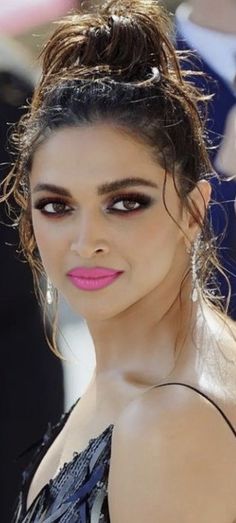 an image of a woman with pink lipstick