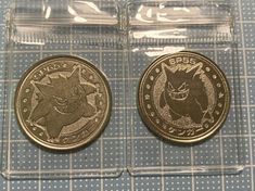 two different types of coin sitting next to each other on top of a blue and white checkered table