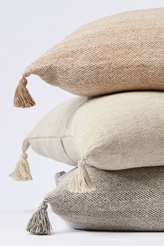 three pillows stacked on top of each other