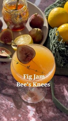 fig jam bee's knees cocktail on a table