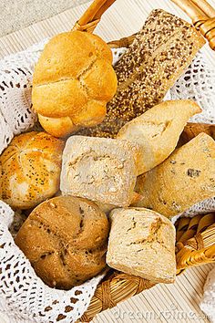 a basket filled with different types of bread