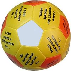 a yellow and orange soccer ball with words on it