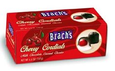 two boxes of chocolate candies with cherries