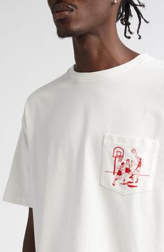 Inspired by a vintage basketball coaster from the 1950s-60s, this crewneck T-shirt features a red embroidered graphic on the chest pocket. 27" length (size Medium) Crewneck Short sleeves Chest patch pocket 100% cotton Machine wash, dry flat Made in Portugal Designer Clothing White Cotton Embroidered Camp Shirt, White Embroidered Cotton Camp Shirt, White Embroidered Shirt With Camp Collar, Vintage Cotton T-shirt With Embroidered Graphics, Bode Embroidered Shirt, Pocket Tshirt, Fabric Gift Bags, Nordstrom Store, Free Fabric