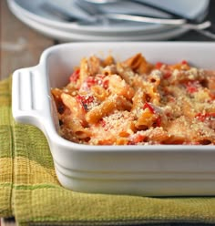 a casserole dish with pasta and meat in it