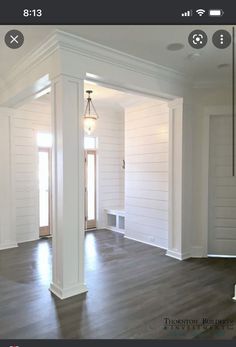 an empty room with hard wood floors and white paint on the walls is pictured in this image