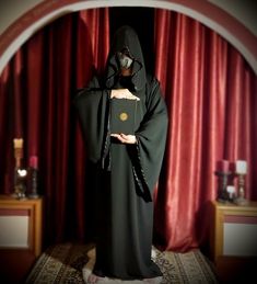 "The black T-shaped Hooded Robe, is a rather standard magical implement throughout Western occultism. The same garment is used by different magical systems and initiation groups throughout the world for centuries now. References to the use of a ritual black Robe with a hood are found in north European witchcraft (Reginald Scots's \"Discoverie of Witchcraft\", 1665), in the initiatory instructions of the Argentium Astrum (A∴A∴) founded by Aleister Crowley (and more specifically concerning the Neo Magical Systems, European Witchcraft, Ritual Clothing, Left Hand Path, Witch Clothing, The Crone, Character Making, Witches Altar, Aleister Crowley