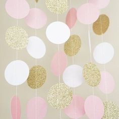 a pink, gold and white party decoration with the text $ 12 24 on it