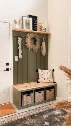 the entryway is decorated with baskets, wreaths and other things to decorate it