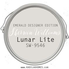 the logo for emerald designer edition, featuring an oval frame with white lettering on it