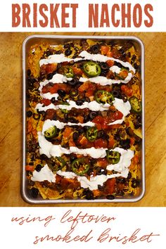 an image of a casserole dish on a table with the words brisket nachos