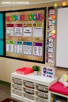 a bulletin board in the corner of a classroom