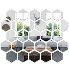 a living room with hexagonal mirrors on the wall and furniture in front of it