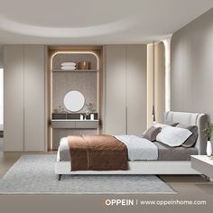 a bedroom with a bed, dresser and mirror on the wall next to a window