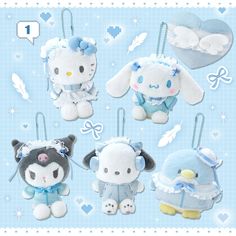 four stuffed animals are hanging from strings on a blue and white background with snowflakes