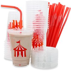 plastic cups with straws and lids are arranged next to each other on a white background