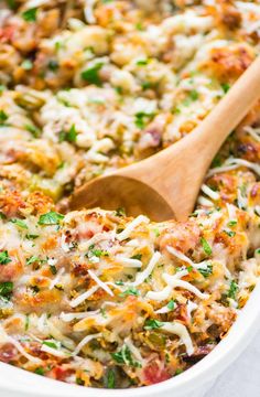 a casserole dish with meat, cheese and vegetables