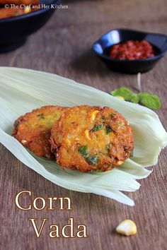 corn vada is served on a leafy plate