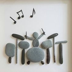 there are rocks and musical notes on the wall