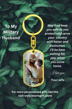 a keychain with an image of a soldier and his wife on it