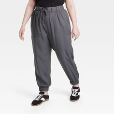 These High-Rise Jogger Pants from Universal Thread™ are made from lightweight lyocell fabric and tailored with a relaxed leg style to keep you in absolute comfort. The full elastic waist with drawstring offers an adjustable, secure fit, while the side pockets provide space for stashing everyday essentials. In a solid hue, they are easy to coordinate with a variety of tops for versatile wear. Universal Thread™: Found exclusively at Target. Lyocell Fabric, Shipt Shopper, Bottom Clothes, Universal Thread, Pull On Pants, Everyday Essentials, Chinos Pants, A New Day, Jogger Pants