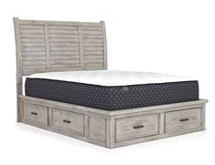 a bed with drawers underneath it and a mattress in the bottom drawer on one side