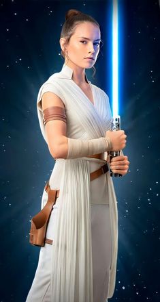 the star wars character is holding a light saber in front of a background with stars