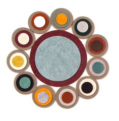 a circular rug with different colored circles on it