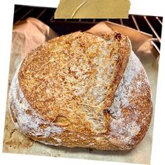 a loaf of bread sitting on top of a piece of paper