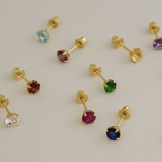 One of our best selling birthstone studs, they are adorable and filled with lots of love. Crafted with best hight quality gemstone and 14K solid gold screw back for safety. * Sold as a pair for the ear. * 14K Solid Gold (Stamped 14K for Purity Authenticity) * AAA Grade Natural Gemstone (4mm) * Featuring a 4-prong Casting-setting * 14K Solid Gold Screw-backs * Enjoy Free Shipping & Free Gift Box ** The size may differ depending on measurement methods. ** The color displayed may vary depending Month Gemstones, Ear Piercing Jewelry, Tragus Conch, Baby Earrings, Mini Studs, Jewelry Post, Gold Baby, Sell Gold, Round Stud Earrings