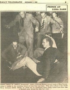 an old newspaper article with a man laying on the ground in front of other men