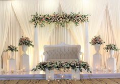 an elegant wedding setup with flowers and candles