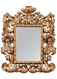 an ornate gold framed mirror on a white background