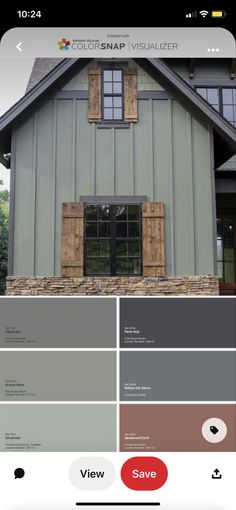 the color scheme for this house is gray and has brown shutters on each side