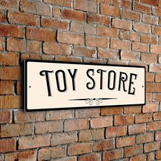 a brick wall with a toy store sign on it