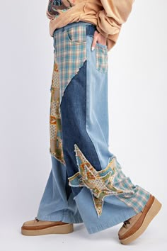 Add a playful touch to your wardrobe with Pretty Patchwork Mix Jeans by Easel! These unique pants feature a mix of patterns and star patches, perfect for those who like to mix and match. With a wide leg silhouette and raw cut seams, these pants also offer comfort and style. Denim Projects Sewing Patterns, Patch Work On Jeans, Patchwork Clothes Scrap Fabric, Upcycling Jeans Ideas, Patched Clothes, Upcycling Pants, Easy Upcycle Projects, Pants Upcycle, Artsy Jeans