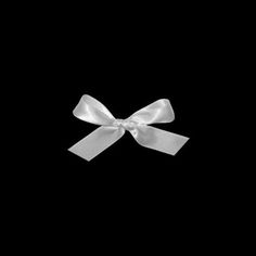 a white bow on a black background