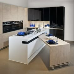 the modern kitchen is clean and ready for us to use