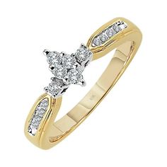 a yellow gold ring with two diamonds on the side and an arrow shaped design in the middle