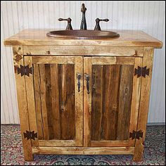 a wooden cabinet with two doors and a sink