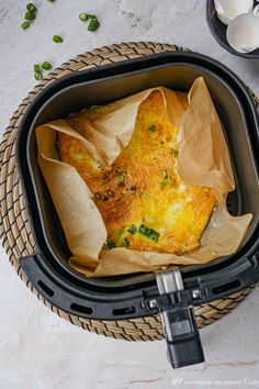 an omelet in a basket on a table