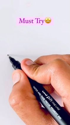 a person writing on a piece of paper with a pen in their hand and the words must try written above it