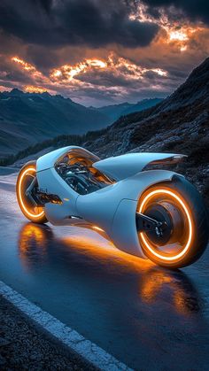 a futuristic car with glowing wheels on the road